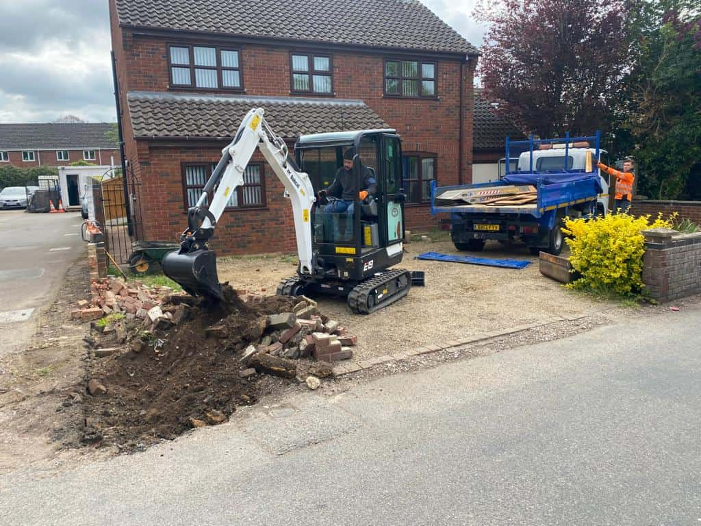 This is a photo of an operative of Ramsgate Driveways Digging out for a new tarmac driveway